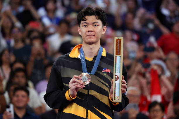 从21分到11分：羽毛球决胜局规则演变与实战影响